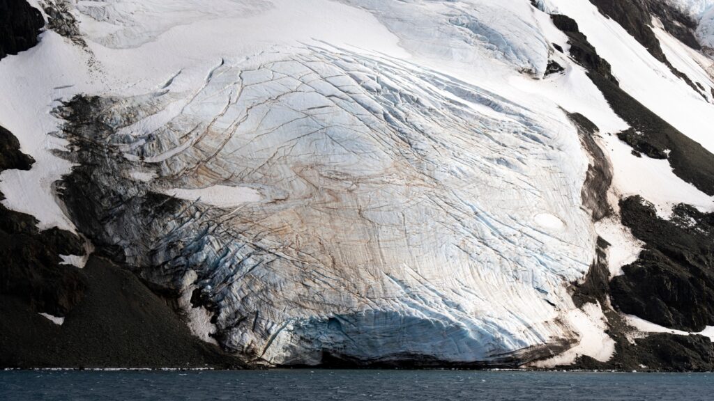 Greenland ice sheet meltwater and floating icebergs