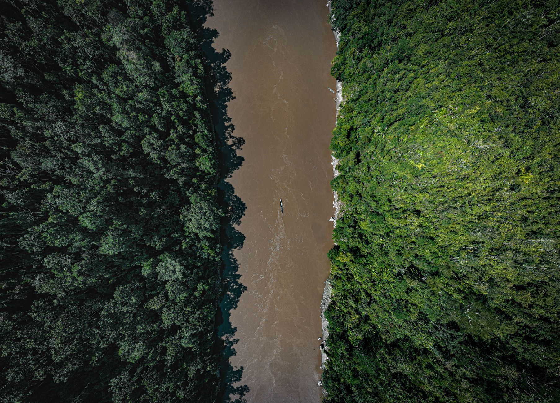 Aerial view of a river through rainforest in Tarapoto, Peru